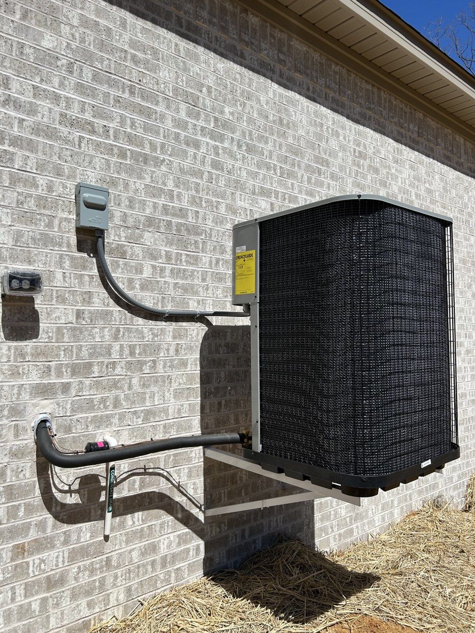Ruby's Air technician installing HVAC unit